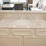 white bathroom vanity with marble top